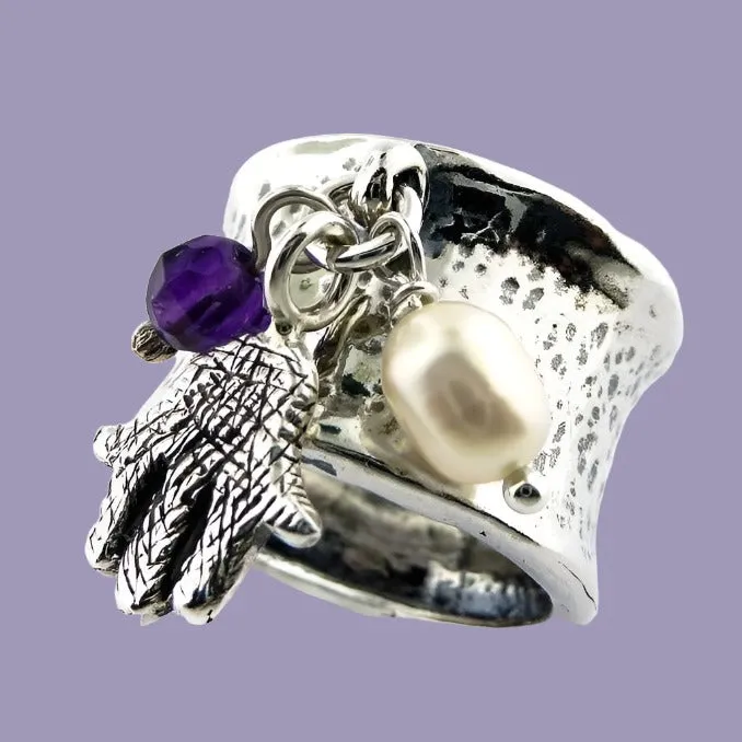 Silver hamsa ring for women with an amethyst and a a pearl