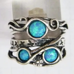 Sterling silver ring set with opal stones. Israeli designer bohemian ring